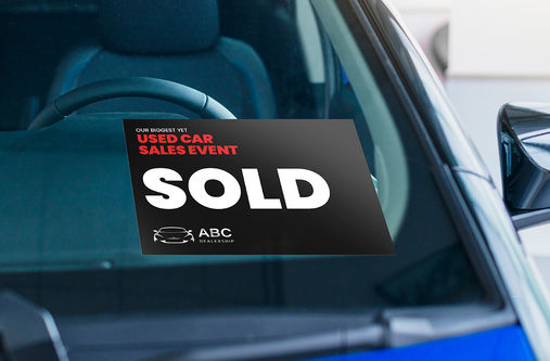 Sold sign for a used car sales event